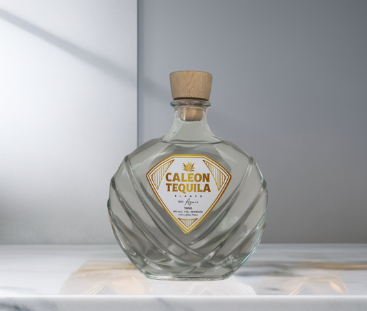 Caleon Tequila 100% Blue Weber Agave Blanco in a uniquely shaped clear glass bottle with wooden cap
