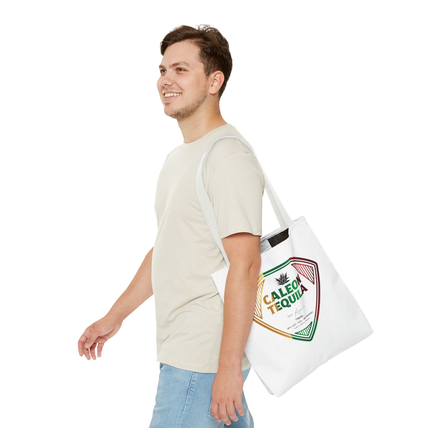 Man carrying a Caleon Tequila reusable tequila shopping tote bag with a colorful design